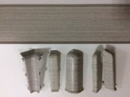 Угол для плинтуса 80/70мммм «Идеал Система»/Деконика Ясень серый / 253 соединительный